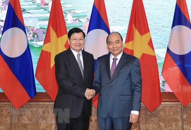 Thu tuong Lao Sisoulith ket thuc chuyen tham, lam viec o Viet Nam hinh anh 1